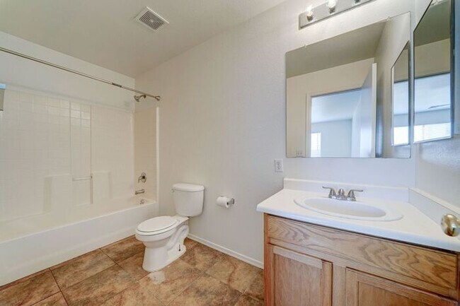 Building Photo - READY TO VIEW NOW! Spacious 3 Bed 2 Bath home in the Estrella Neighborhood