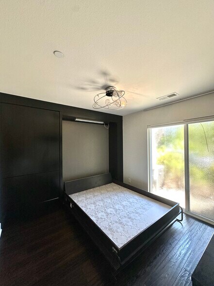Entry level Bedroom with Murphy Bed and Ensuite Bathroom - 7870 Civita Blvd