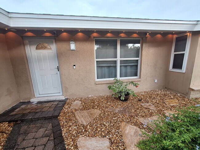 Building Photo - Gulf Access Home on Canal Available Now