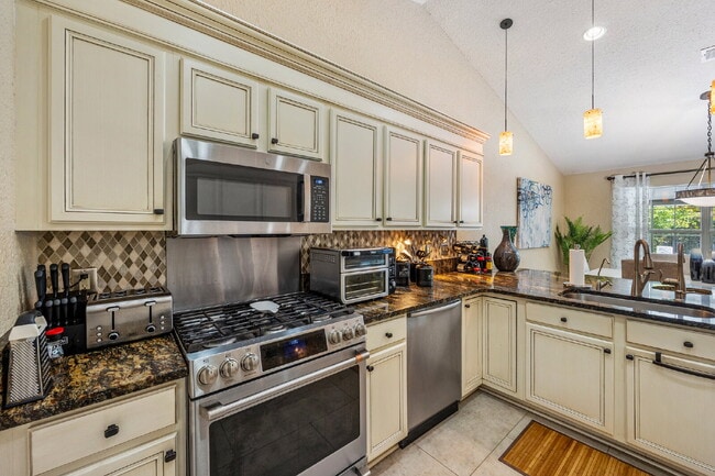 Building Photo - "Coastal Elegance Awaits: Spacious 4-Bed Oasis with Granite Touches on Shipwreck Road"