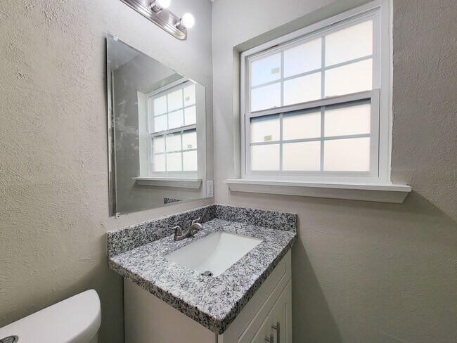 Building Photo - REMODELED/ UPDATED 4 BEDROOM 2 BATH WITH C...