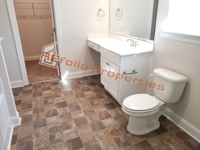 Building Photo - Charming 4 Bedroom, 2.5 Bath, 2-Car Garage...
