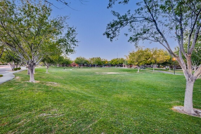 Building Photo - FULLY FURNISHED! Exudes sophistication with designer touches throughout