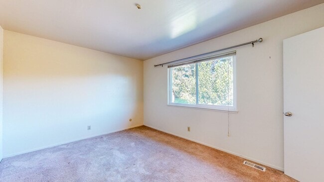 Building Photo - 2 story 2 bedroom 1 bath condo with covered parking, private storage and community pool!