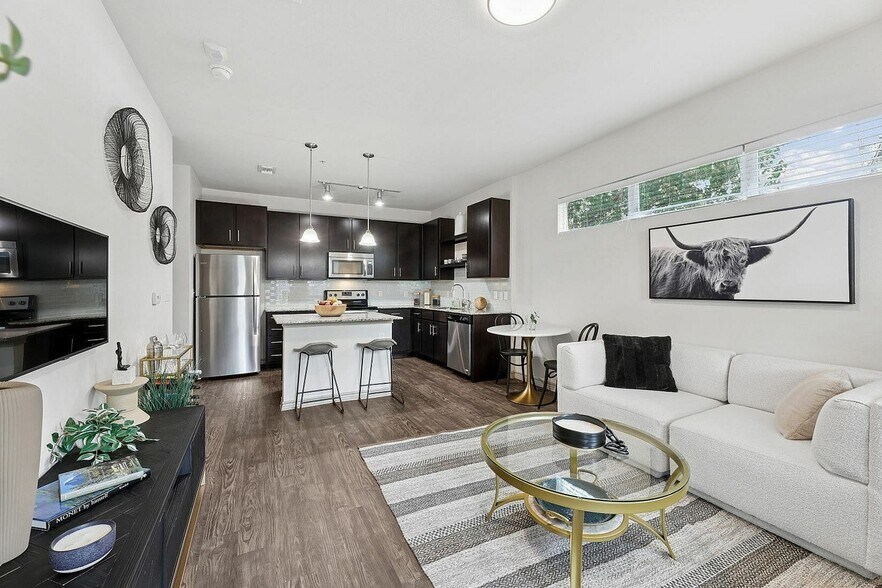 Living area connected to spacious kitchen - Highline Apartments