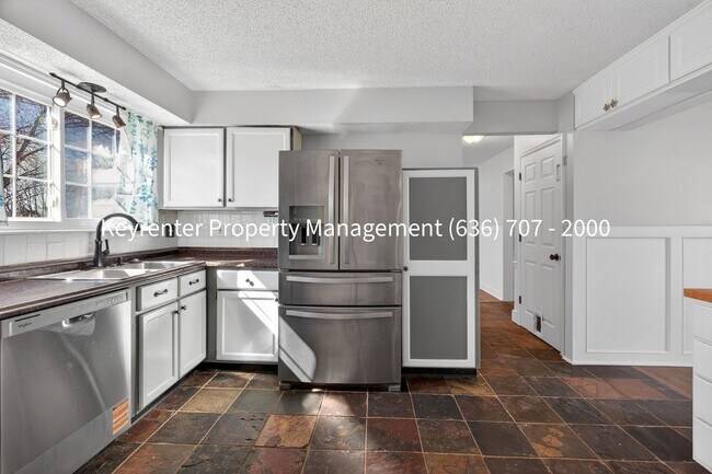 Building Photo - Spacious 4BR Home with Finished Basement in St. Peters