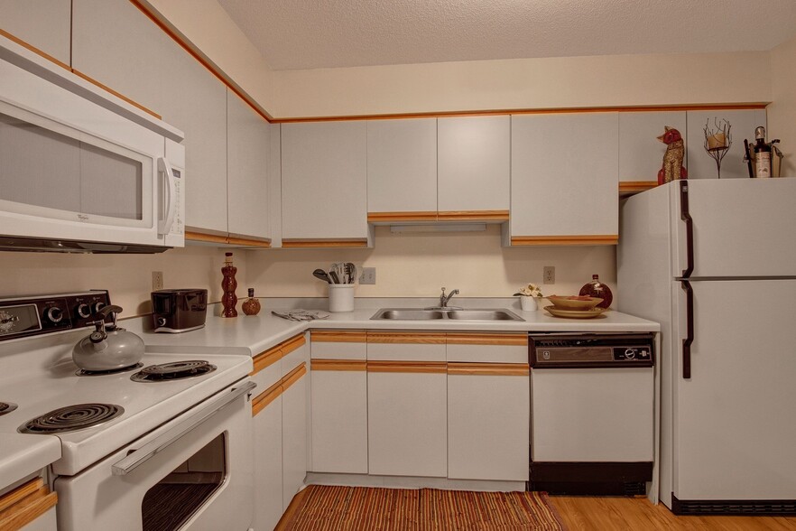 Town Centre Kitchen View with Oven, Microwave, and Fridge - Town Centre