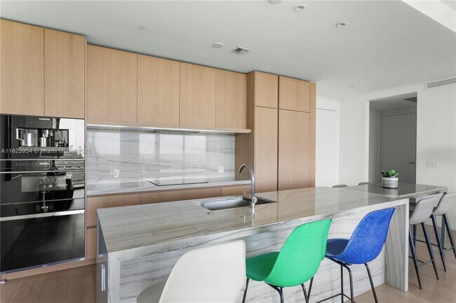 Building Photo - 8701 Collins Ave