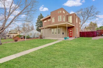 Building Photo - 4 Bedroom 3 Bath With Tons of Character Ne...