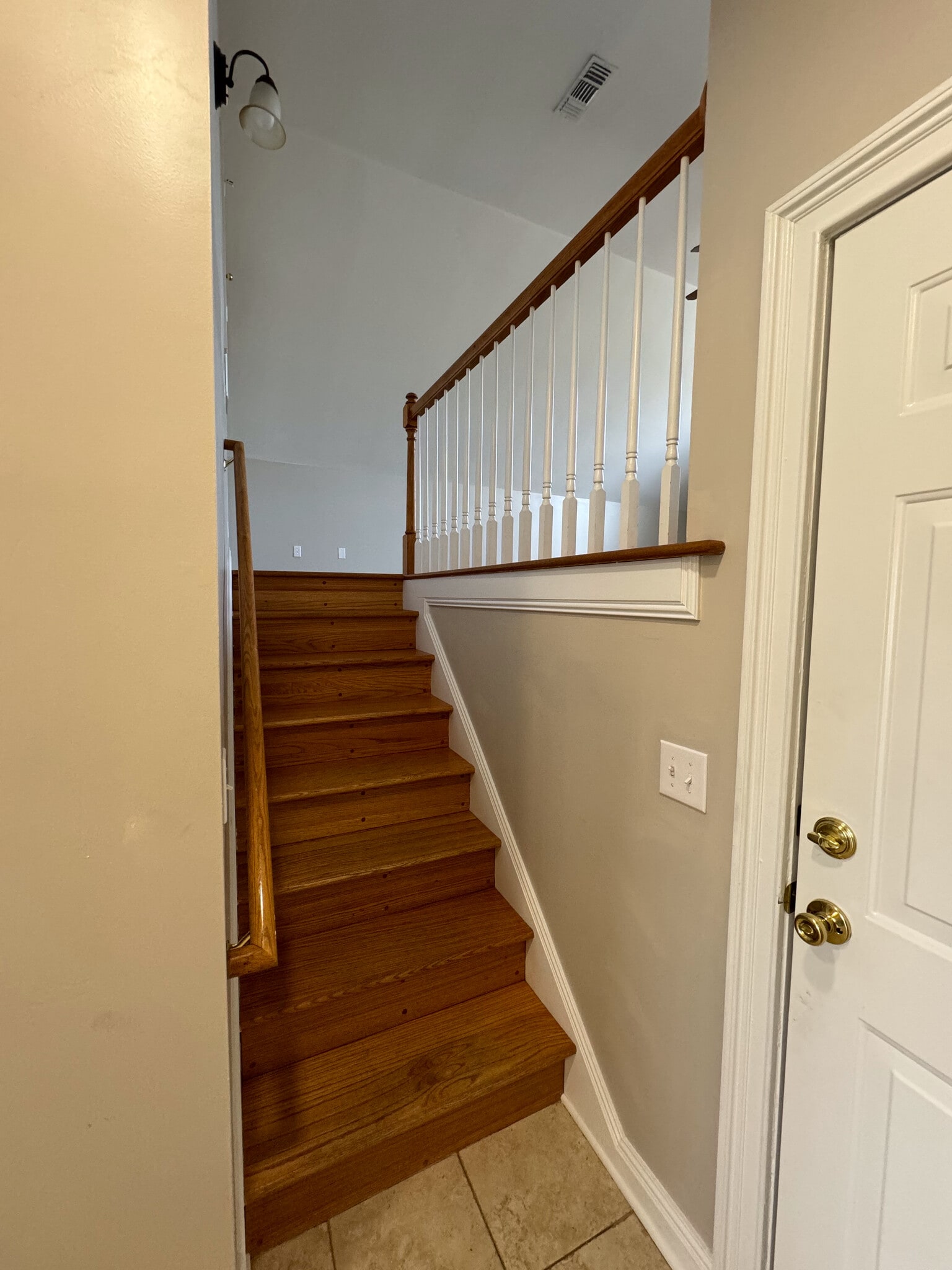 Bonus room stairs and garage door - 806 Muscogee Way