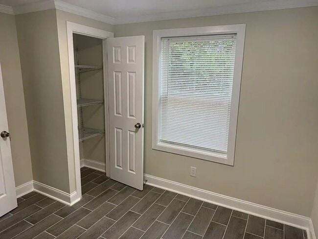 Building Photo - NEWLY REBUILT ONE LEVEL LIVING SPACE