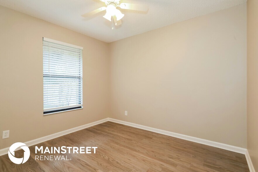Building Photo - 6353 Tree Top Cir W