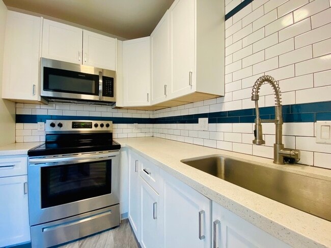 Building Photo - 1/2 Off First Full Month's Rent! Spacious Design Meets Modern Living in this Private 2 bedroom 1 ...