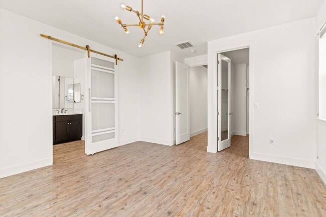 Building Photo - Sun-Filled Corner 4BR w/ Dual Yards & Panoramic Indoor-Outdoor Flow