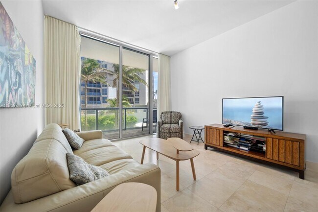 Building Photo - 6799 Collins Ave