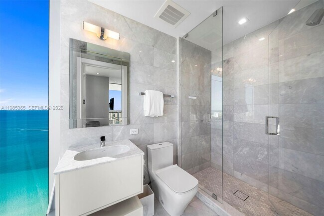 Building Photo - 18501 Collins Ave