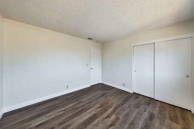 Building Photo - 3 Bedroom Home with Fireplace and LVP Flooring & 2-Car Garage!