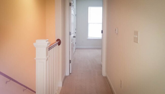 Building Photo - Steps from Shopping, Dining, & Entertainment in The Market Common