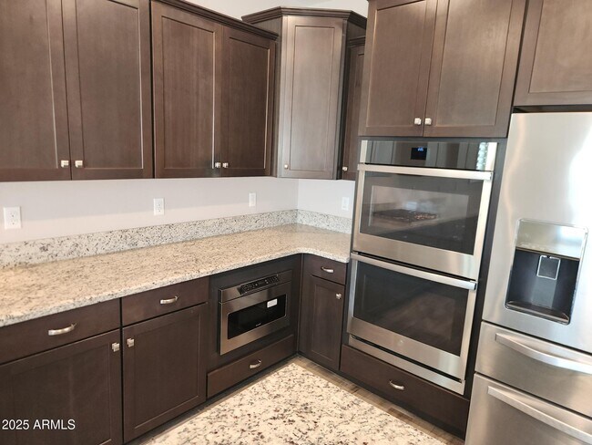 Building Photo - 13431 W Range Mule Dr