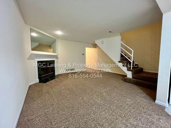 Building Photo - This spacious townhome is ready for you to...