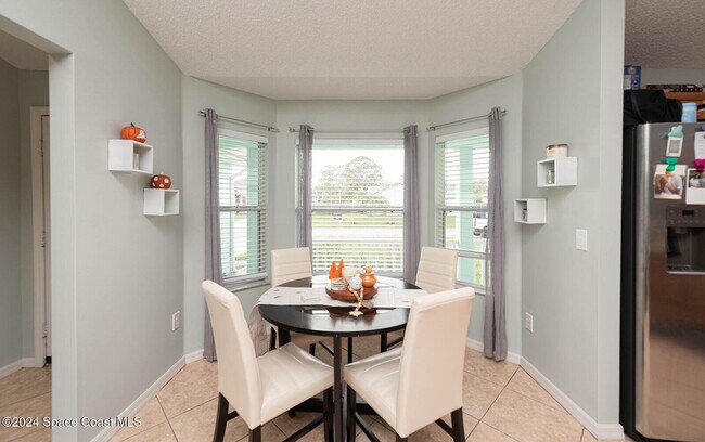 Building Photo - 721 Taluga Ave SE