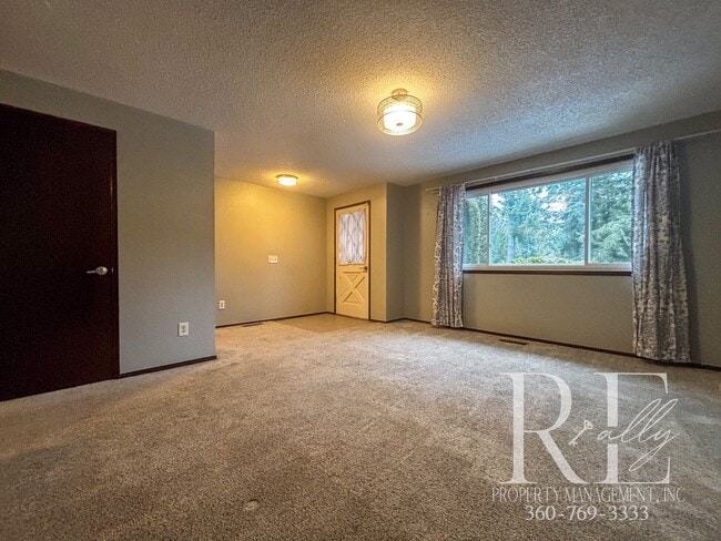 Building Photo - Cozy 3-Bedroom Home in Desirable Poulsbo Neighborhood