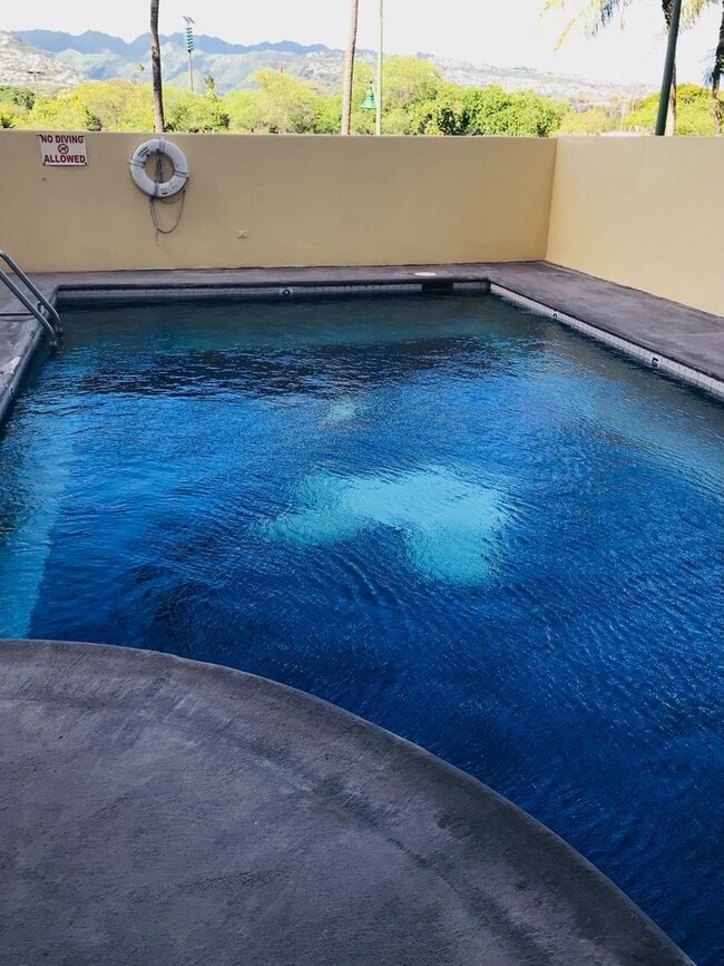 Building Photo - Kealani 2 Bdrm., 2 bath, 1 cov'd/sec'd Pkg. - Pool