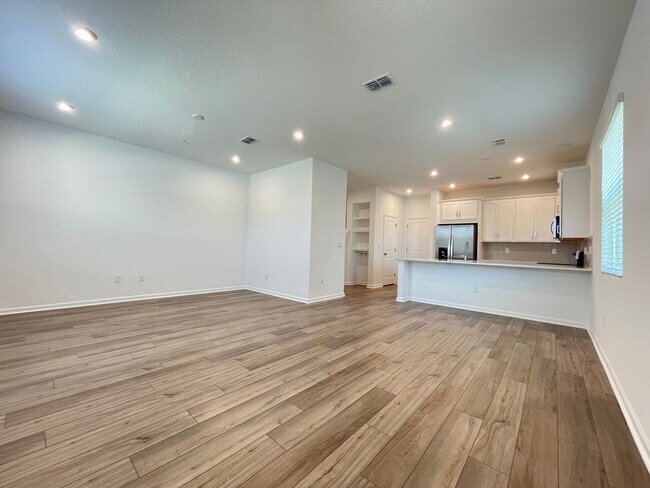 Building Photo - Newer 4 Bedroom, 2.5 Bath Corner Unit Town...