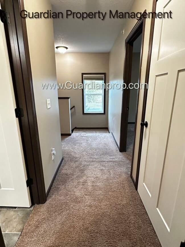 Building Photo - Lakeville Corner Unit, Walk out Patio, 2 Car Garage, W/D on Upper Level, 2.5 Baths