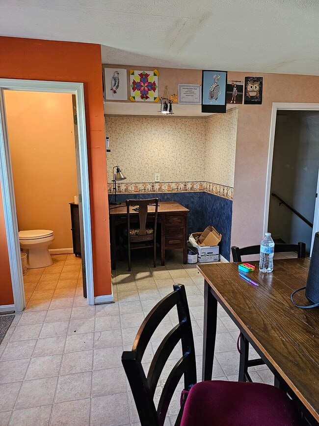 Half bath, breakfast nook, items not included - 130 Little River Dr
