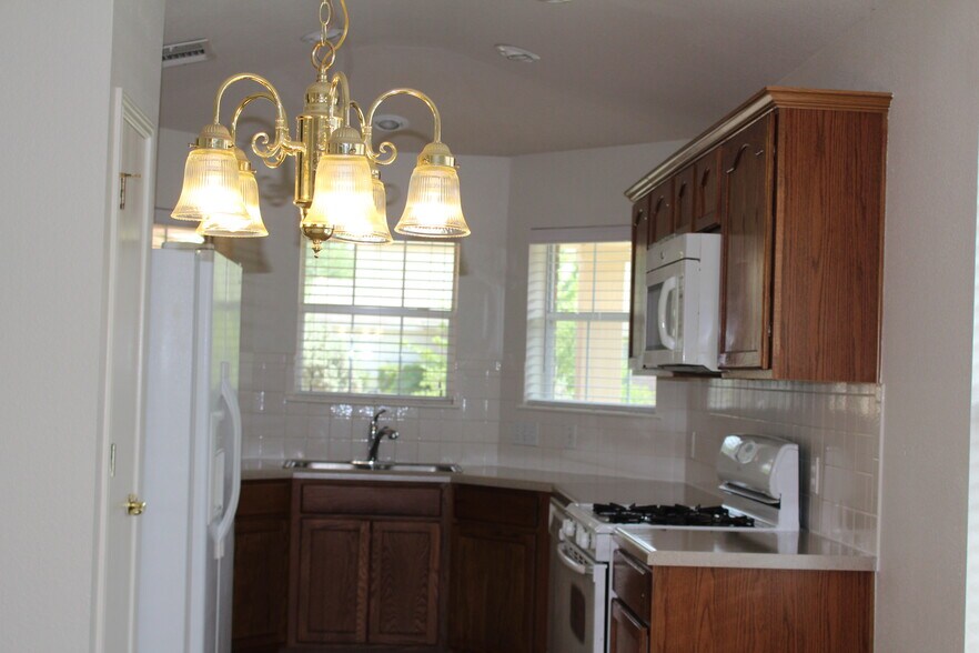 Kitchen view from dining room - 5605 Bentsen Ln