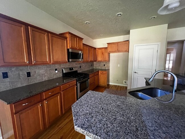 Building Photo - "Luxury Living: Stunning home with marble counter tops & Fireplace!"