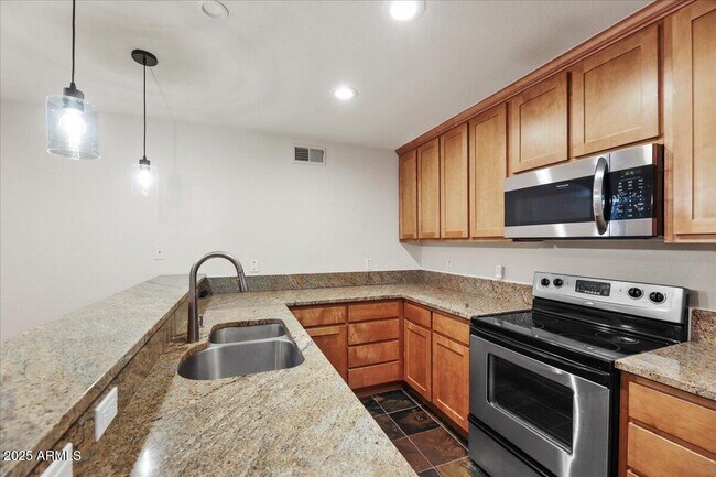 Building Photo - 4704 E Paradise Village Pkwy N
