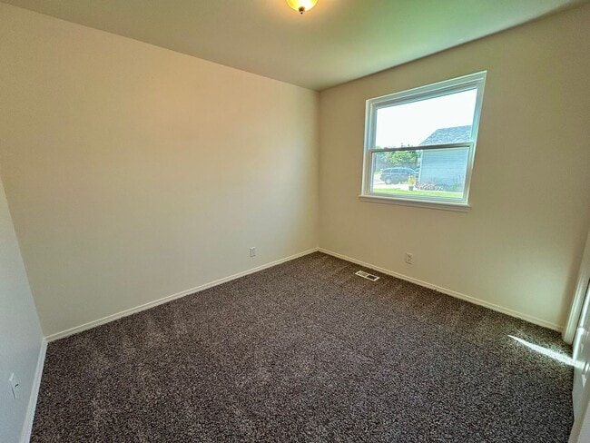 Building Photo - Spacious 4-Bedroom Home with RV Parking & No Backyard Neighbors
