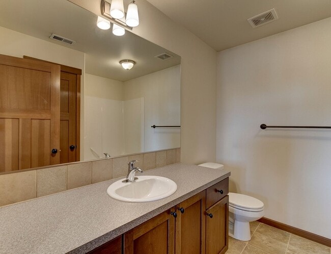 Building Photo - Spacious 3 Bedroom Plus Office with AC, Gas Fireplace and Fenced Backyard