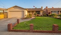 Building Photo - Updated Three Bedroom Gem with Gorgeous Hardwood Floors