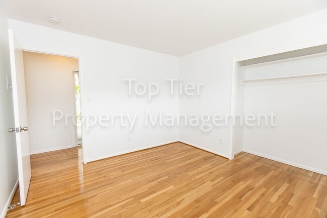 Building Photo - Charming Mid-Century Home | 4BR, 3BA | 2,4...