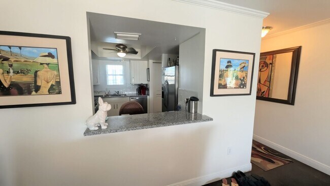 Building Photo - SEASONAL 2/2 coastal-inspired luxury condo with bay view, and boat slip