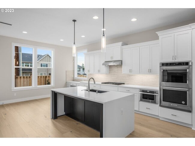 Building Photo - Beautiful 4 Bedroom + Office Home with Open Layout, Gourmet Kitchen & Large Entertainment Room