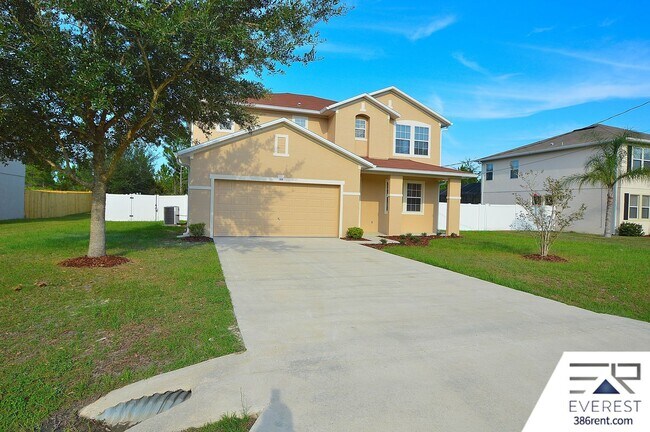 Building Photo - SPACIOUS, FULLY FENCED 4/2.5/2 IN DESIRABLE MATANZAS WOODS