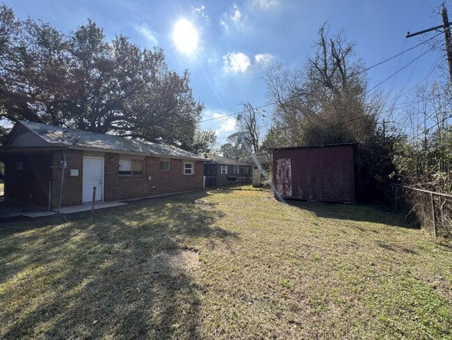 Building Photo - Cozy Brick Home with Covered Parking – Denova St.