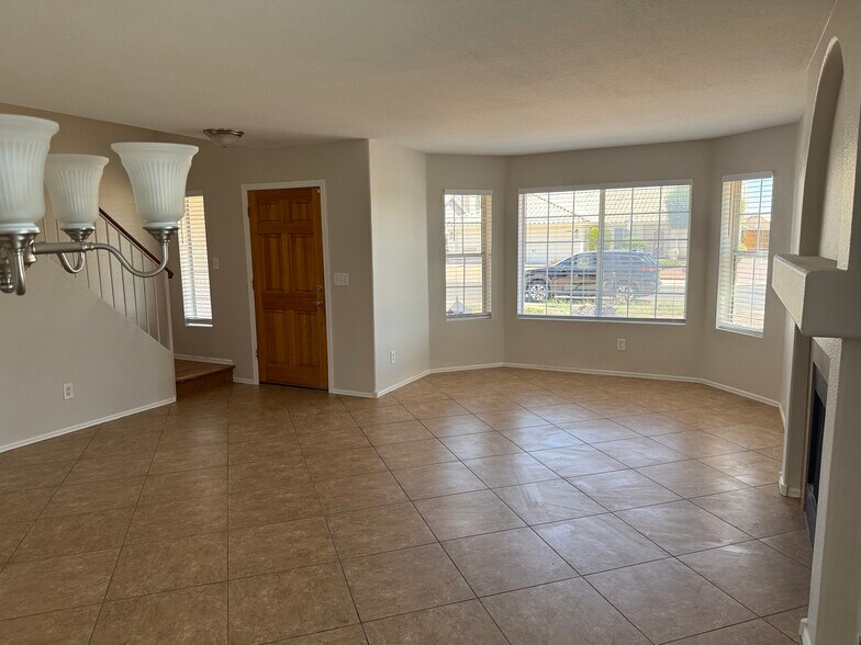 Building Photo - 8460 W Aster Dr