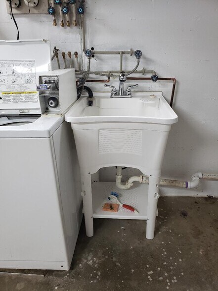 Newly Installed Utility Sink & Faucets - 4525 Roth Ave