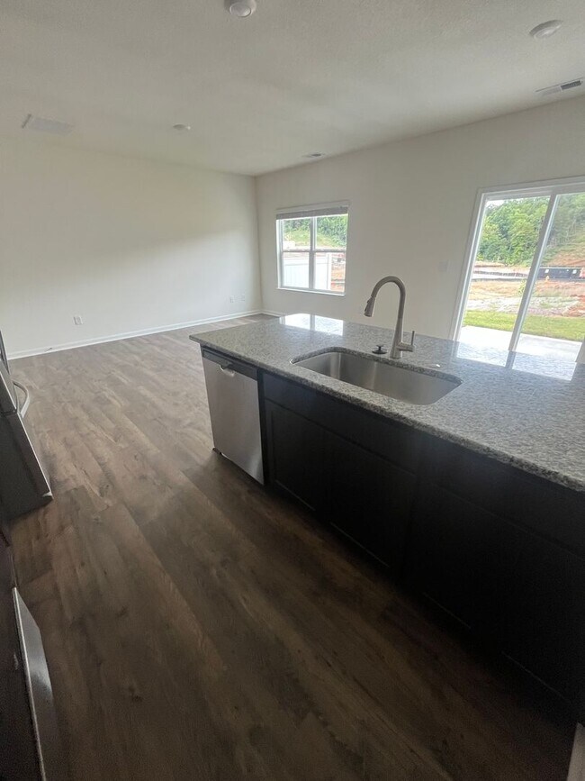 Building Photo - Brand New Townhome – Modern Comfort & Conv...