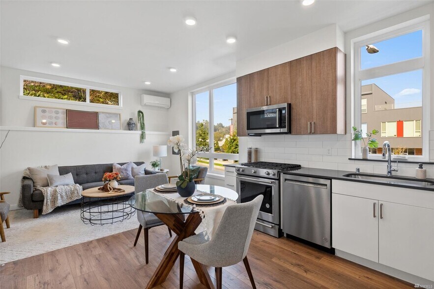 Beautiful windows let in loads of natural light. Home comes with custom shades for all windows - 2117 S Walker St