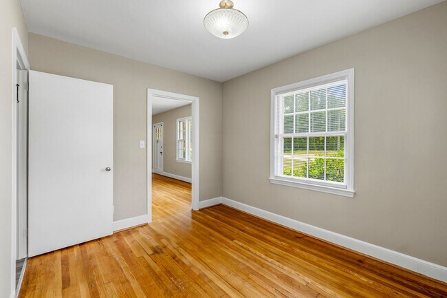 Building Photo - Large Renovated Ranch Home, Two Kitchens & Two Living Areas, Hardwood Flooring, Deck, Fenced!