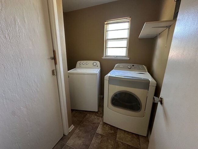 Building Photo - Welcome to this conveniently located 2-bed...