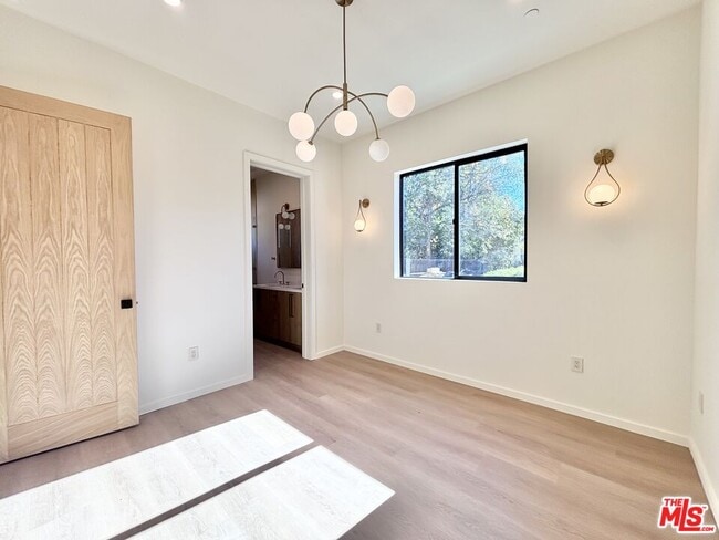 Building Photo - 17850 Saticoy St