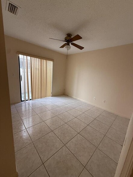 Building Photo - 12028 Royal Palm Blvd