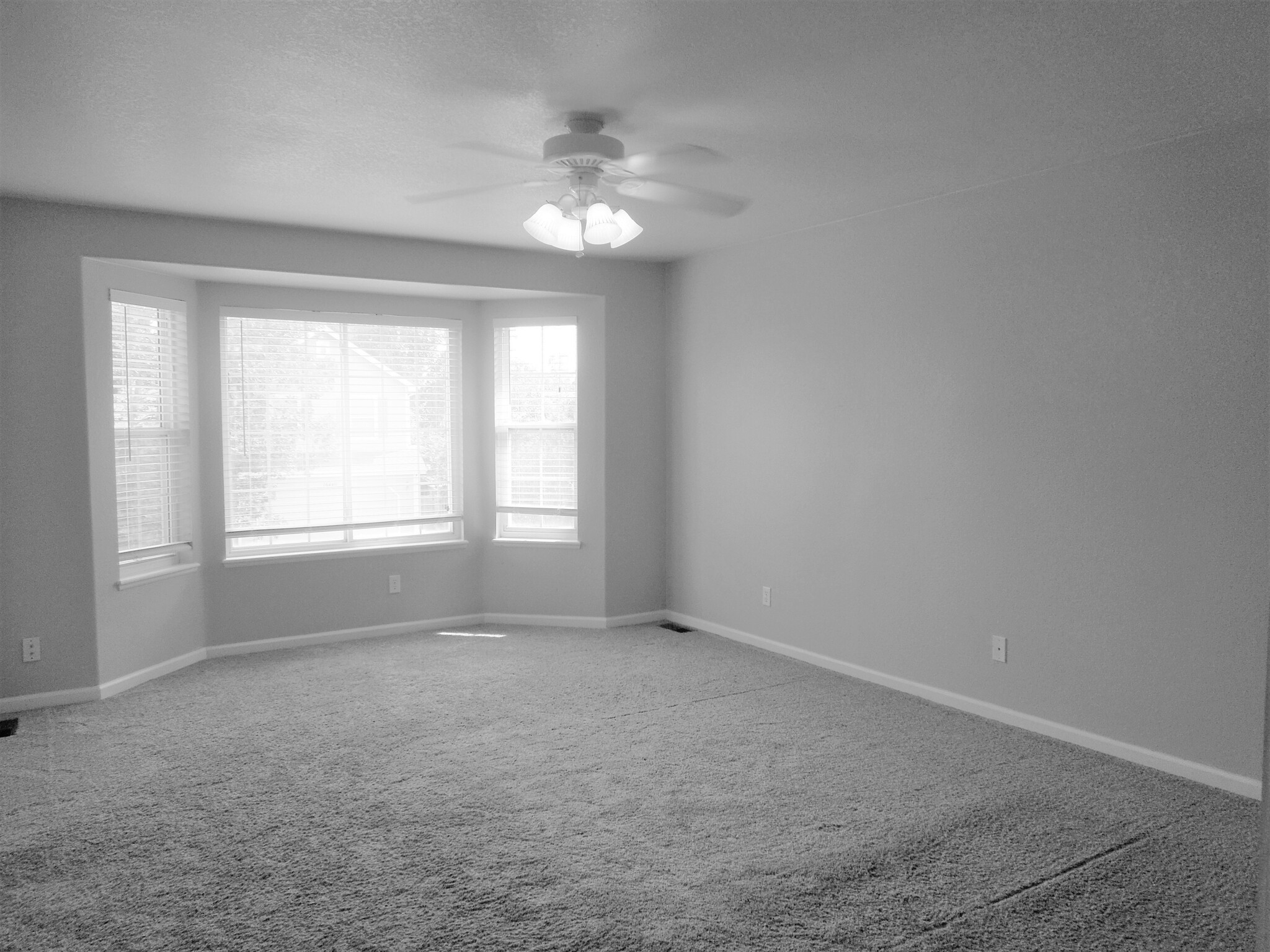Primary bedroom with a ton of natural light - 16441 Martingale Dr